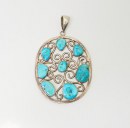 Huge vintage sterling silver turquoise nuggets oval pendant by Charles Albert